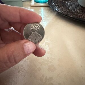 Elegant Silver Coin with Portrait